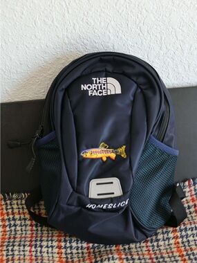 The North Face kid’s Navy Blue Homeslice Backpack